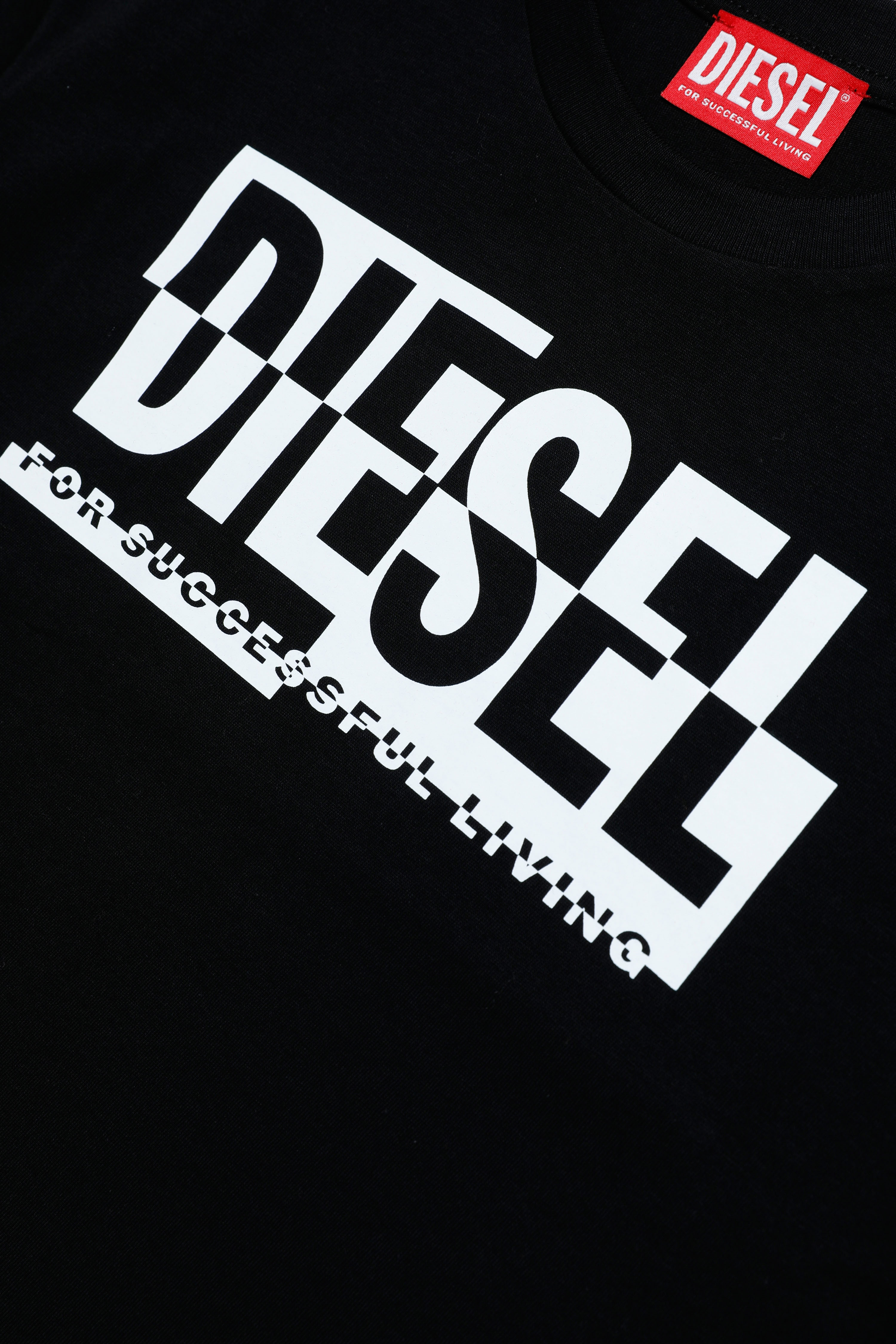 Diesel - TNISSEBR, Woman's T-shirt with chequerboard Diesel logo in Black - 3