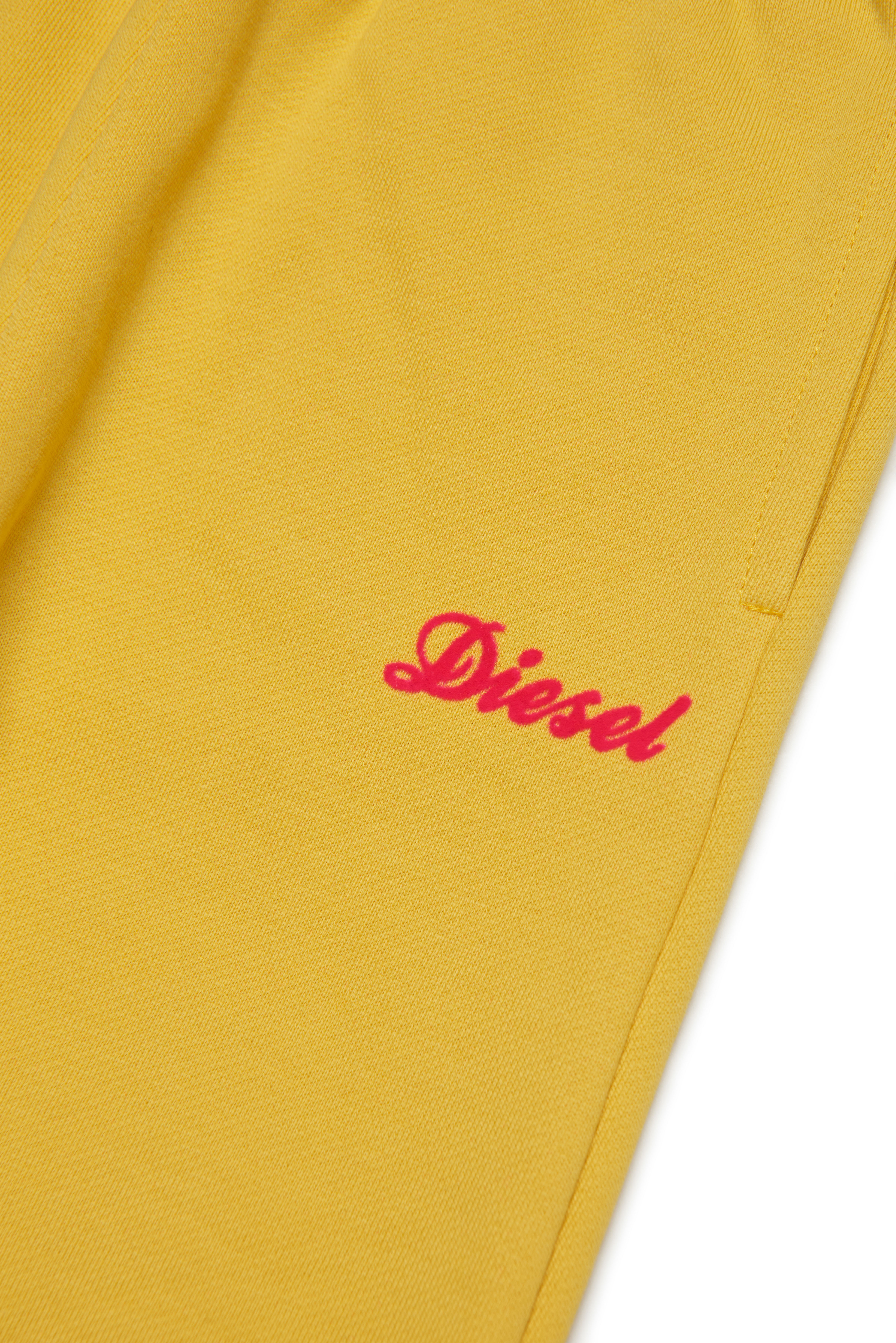 Diesel - PLIVETTIB, Woman's Track pants with cursive Diesel logo in Yellow - 3
