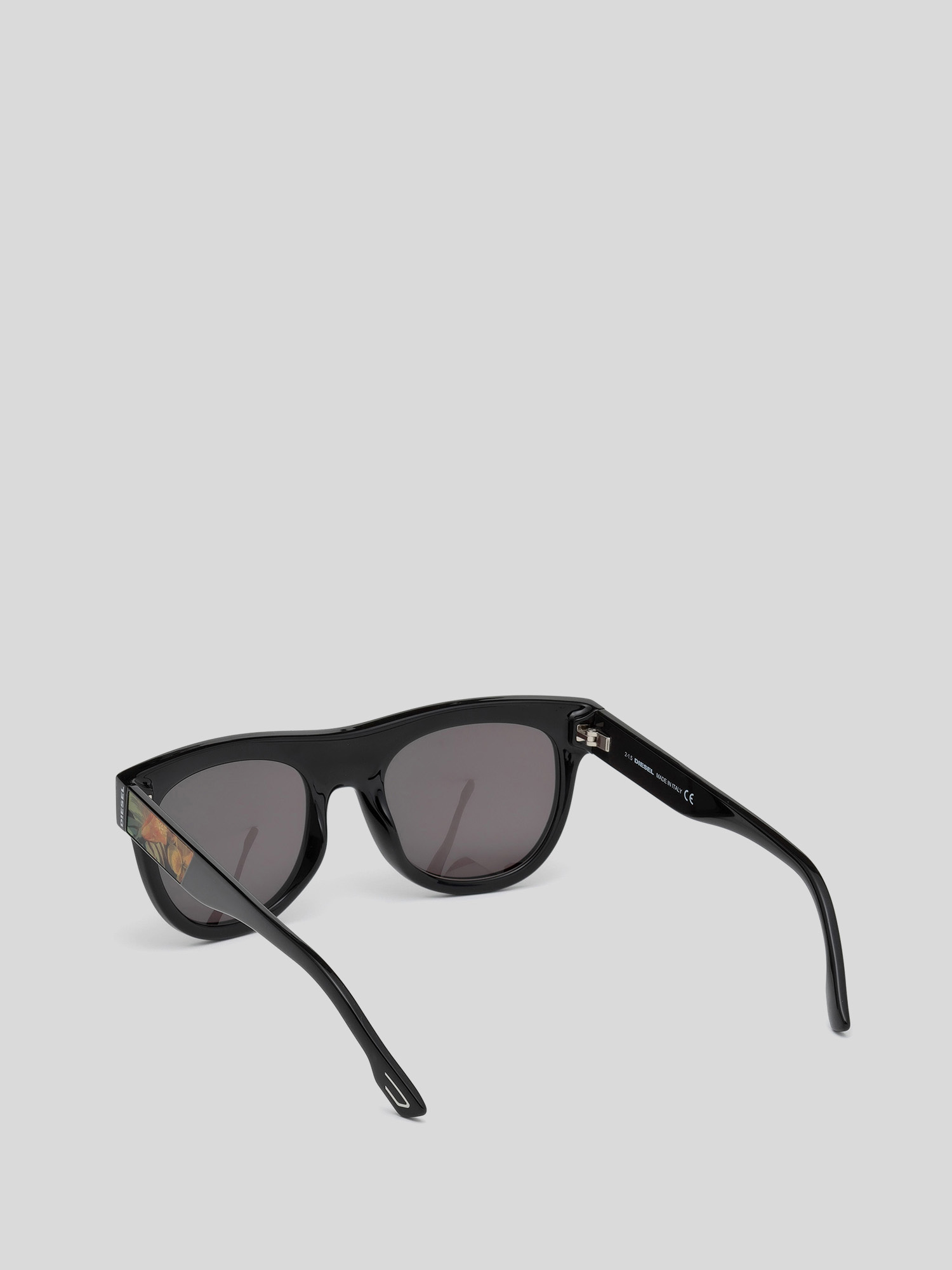 Diesel - DM0160, Unisex's Innovative eyewear with kinetic effects in Black/Orange - 1